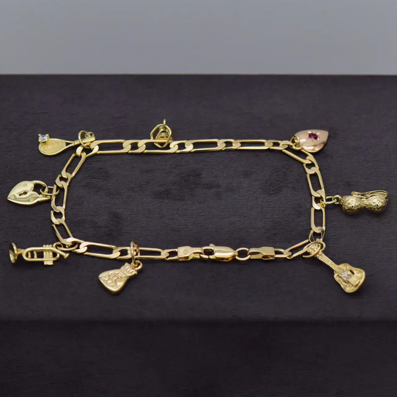 9ct Yellow Gold Charm Bracelet [Figaro-Link] - Thumbnail 1